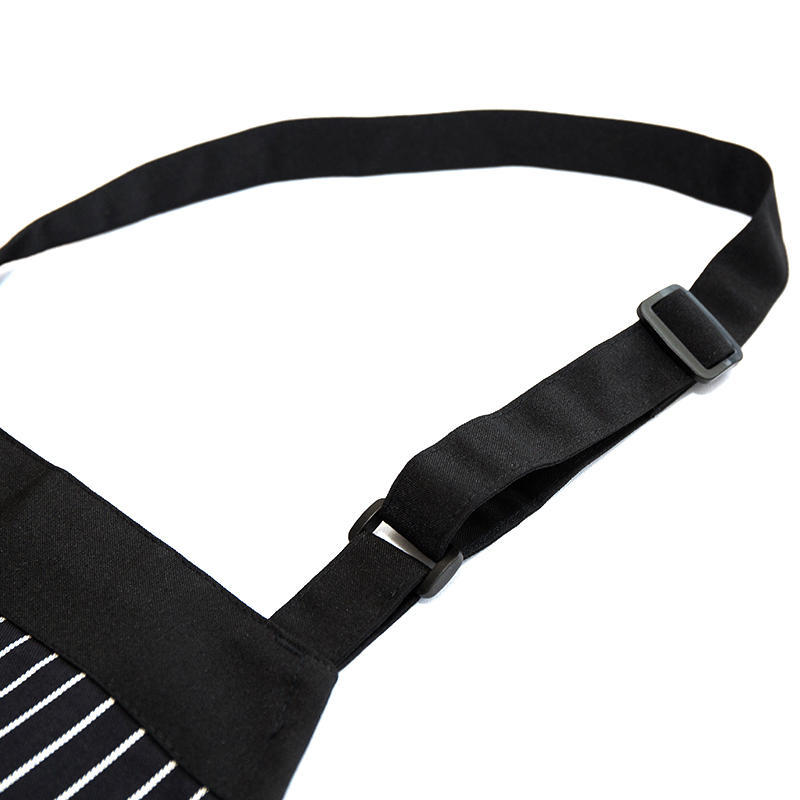 Black and white striped polyester/cotton neck apron with pockets and adjustable buttons